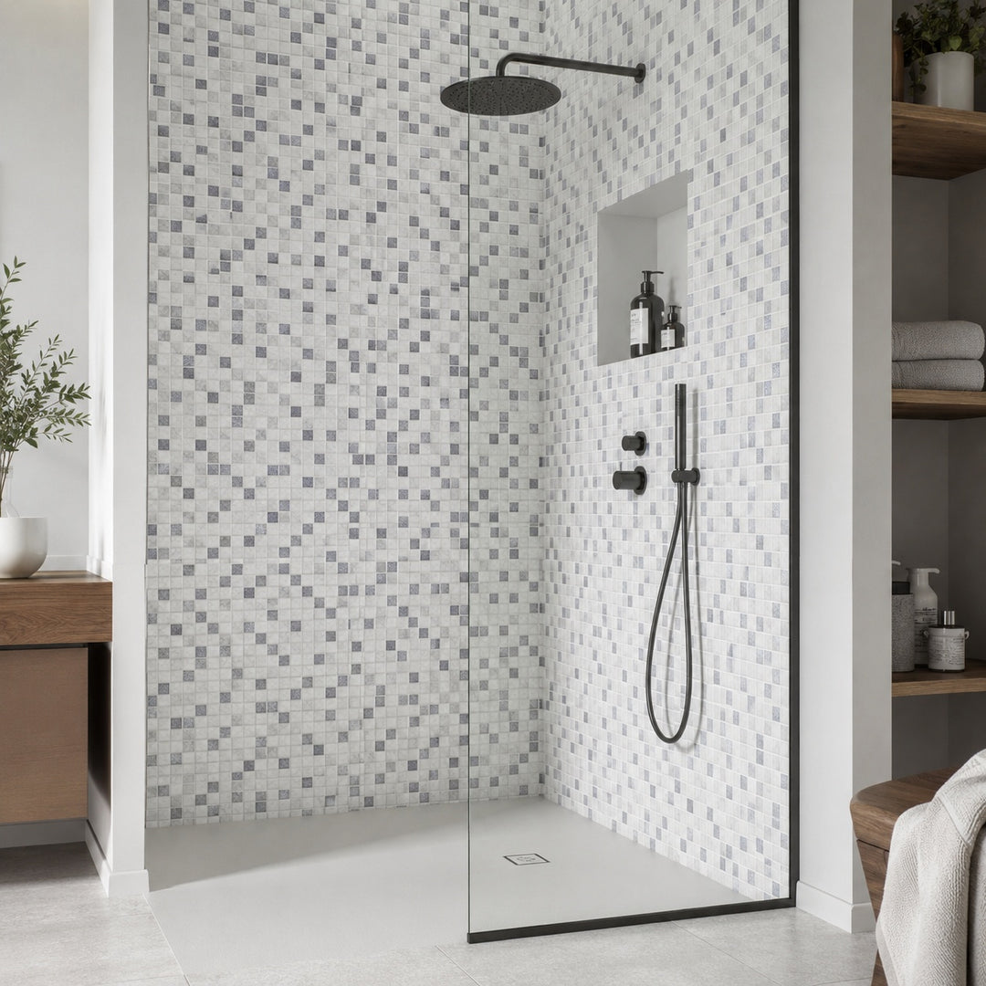 Livorno Square 31.1 x 31.1cm mosaic sheet featuring a blend of grey and white square mosaic tiles, creating a contemporary walk-in shower with a modern stone-effect finish.
