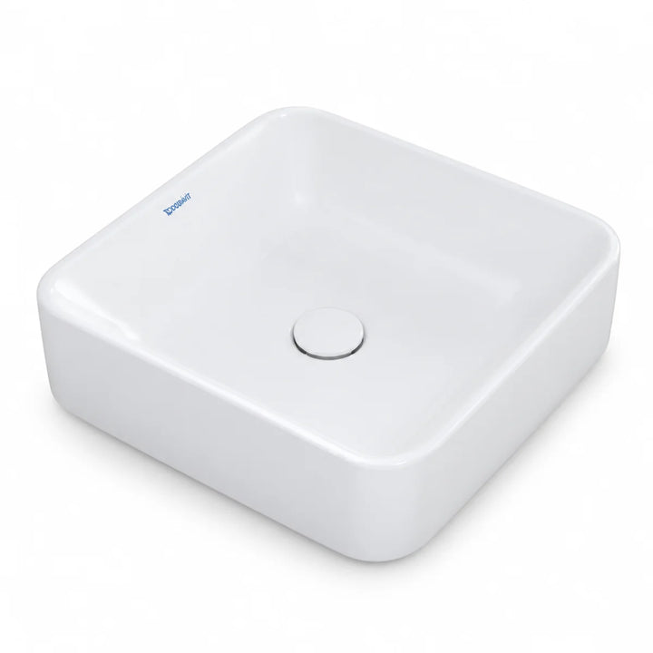 Duravit Durapoint square countertop washbowl in white, shown from a raised angle with round waste cover in the centre