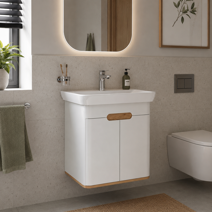 VitrA Sento 650mm matt white wall hung washbasin unit with two soft-close doors, handleless design, ceramic basin and integrated ambient LED lighting.