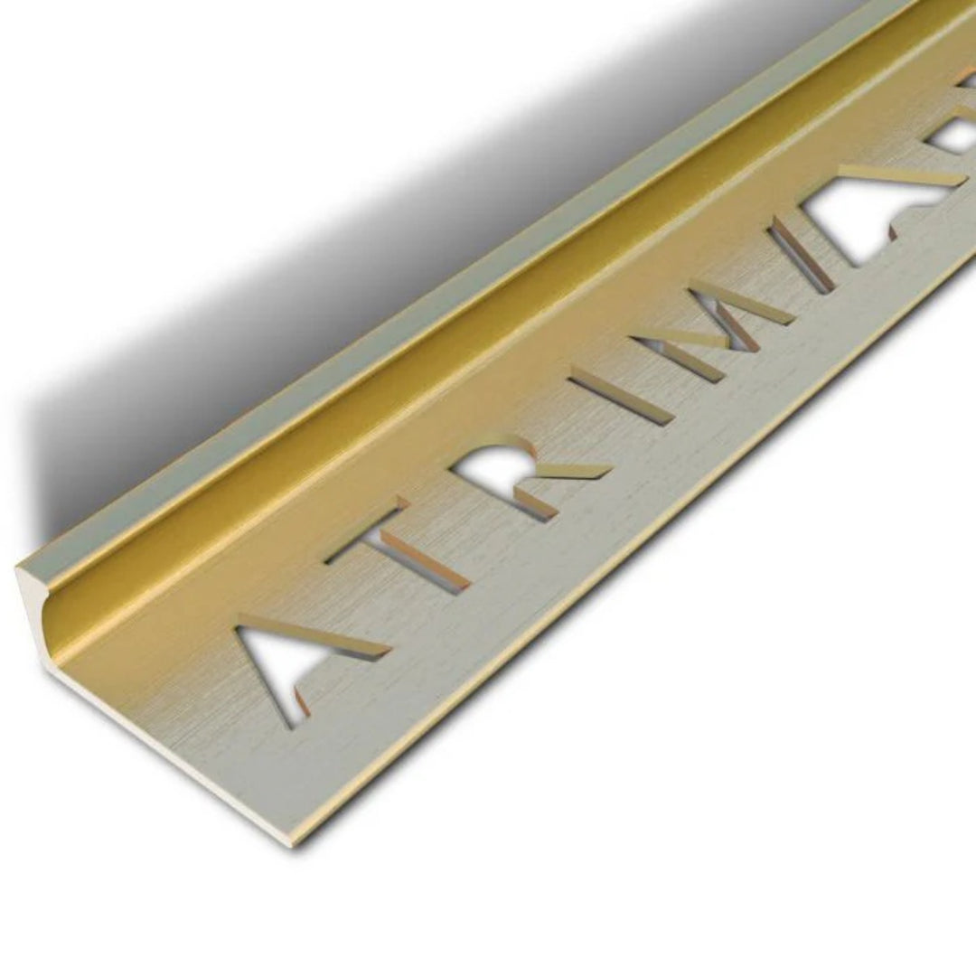 Atrim 12mm straight edge aluminium tile trim in brushed brass effect, 2.5m long, designed to protect exposed tile edges and create a premium finish for 10mm tiles.