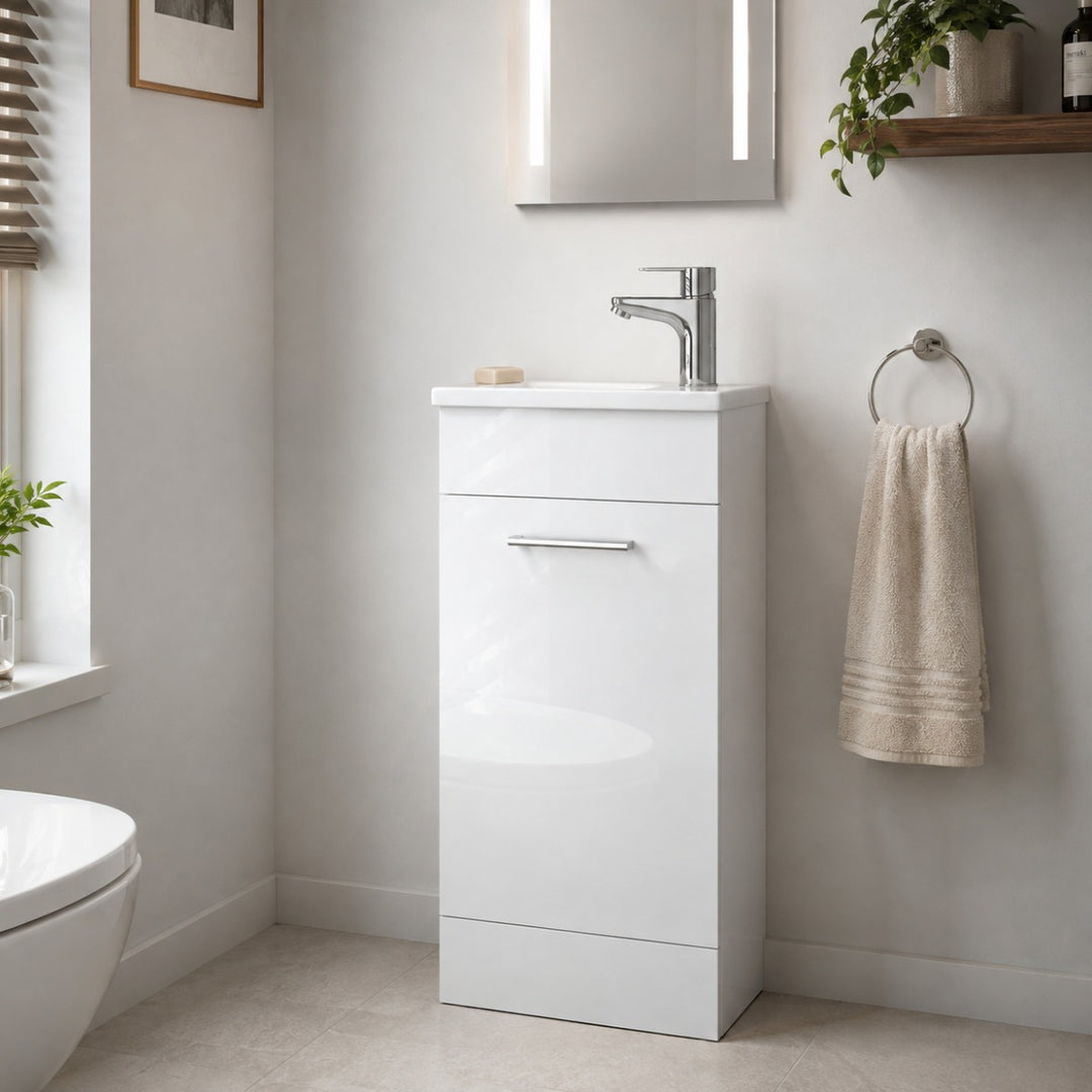 Vitra Mia 400mm white high gloss floor standing washbasin unit with integrated basin, single door and chrome handle.
