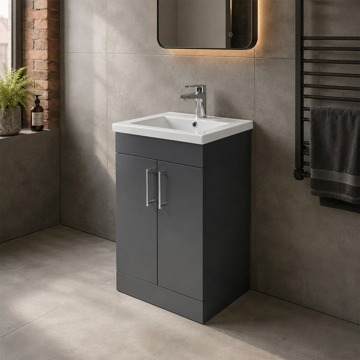 Ardan 600mm 2 Door Floor Standing Vanity Unit in Anthracite with integrated ceramic basin, chrome handles and a contemporary freestanding design.