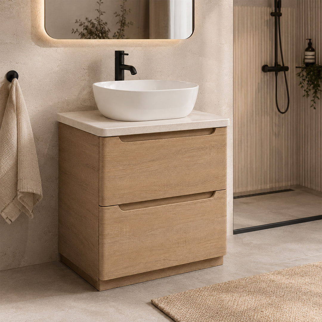 Camden 800mm floorstanding vanity unit with white worktop in Bardolino Oak, featuring a white worktop in a contemporary bathroom.