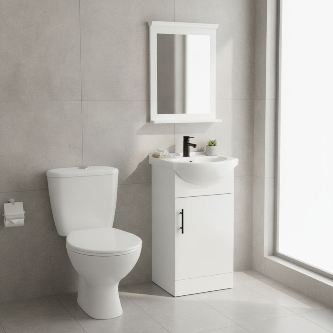 Vitra toilet and 450mm gloss white vanity unit pack with matching mirror, black basin mixer tap, black slotted basin waste and black bar handle, designed for modern bathrooms and cloakrooms.
