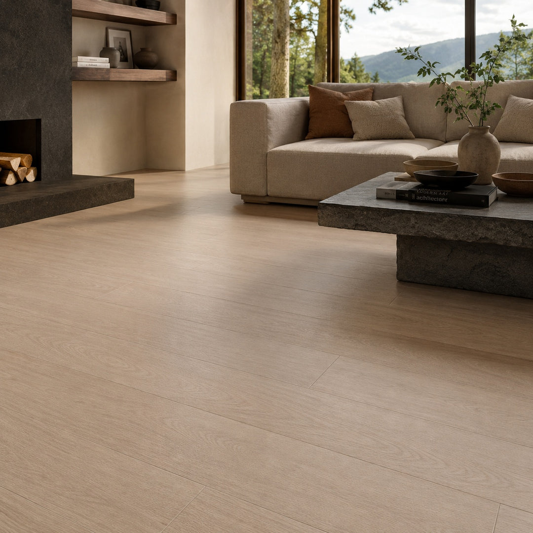 Fika Maple 20 x 120cm rectified wood effect porcelain floor tiles in a warm maple finish, installed in a contemporary open-plan living space.