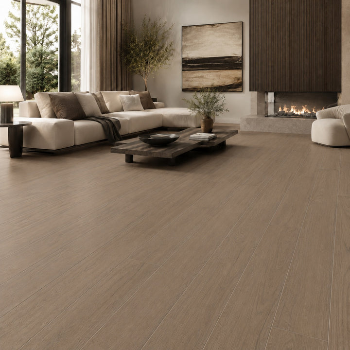 Fika Taupe 20 x 120cm rectified wood effect porcelain floor tile in a warm taupe finish, creating a natural timber appearance with the durability of porcelain.