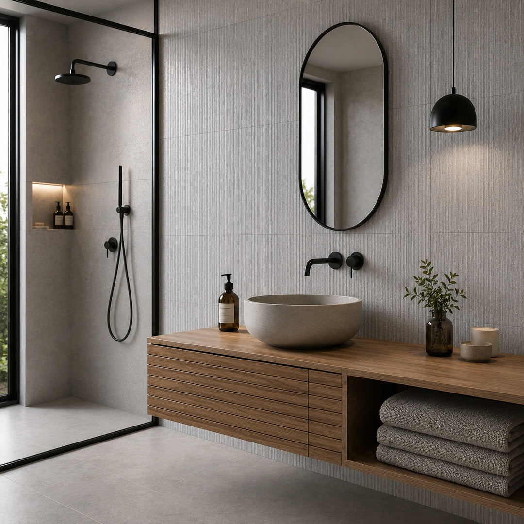Stoneface Perla 33.3 x 55cm Decor Wall Tile featuring a textured light grey stone-effect finish, creating a contemporary bathroom feature wall.