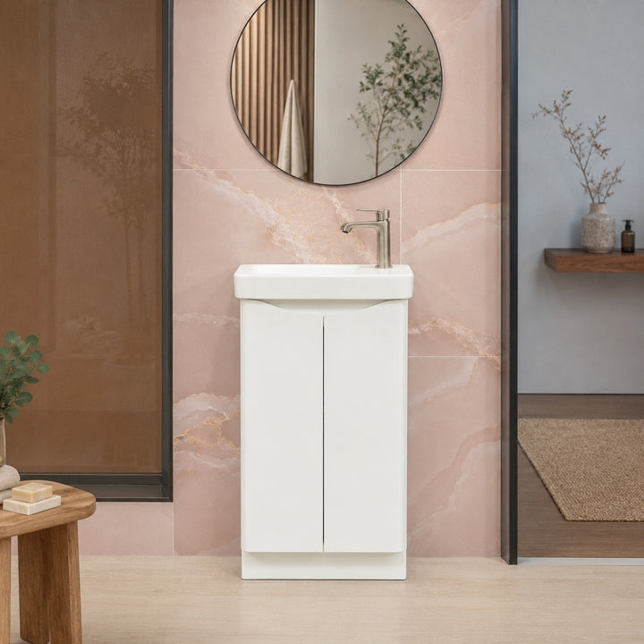 Happi 500mm freestanding cloakroom vanity unit in matt white with two soft-close doors and ceramic basin.