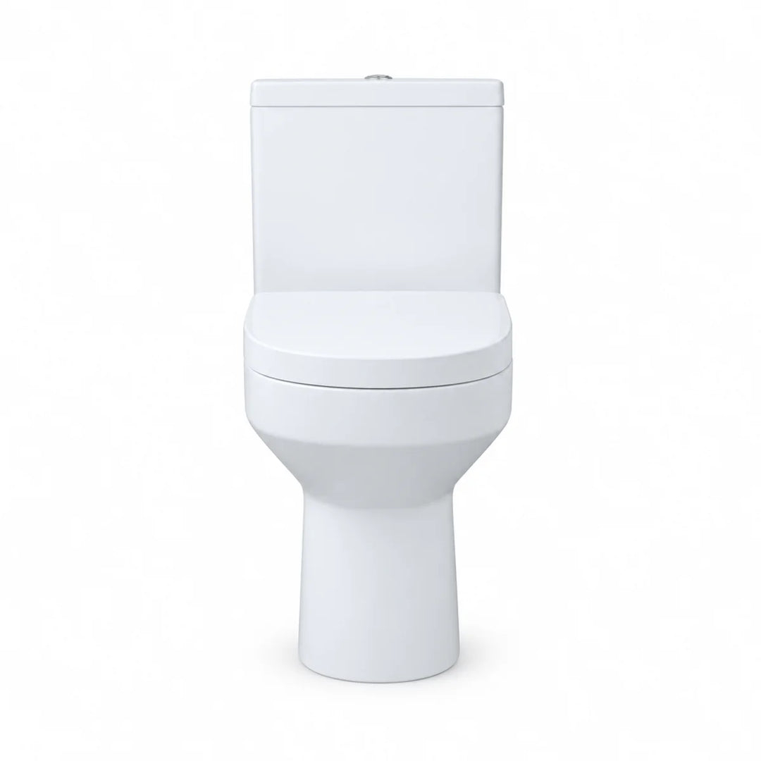 Harmony rimless close coupled toilet in white with soft close seat, front view against a plain white background