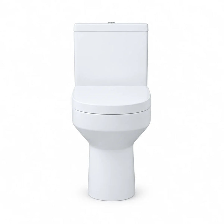 Harmony rimless close coupled toilet in white with soft close seat, front view against a plain white background