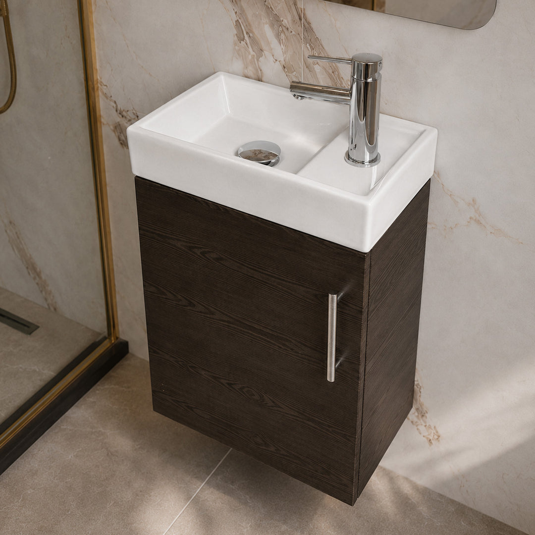 Mito 400mm wall-hung cloakroom vanity unit in Anthracite Oak with compact ceramic basin, satin chrome knurled handle, chrome basin mixer tap and matching slotted basin waste.