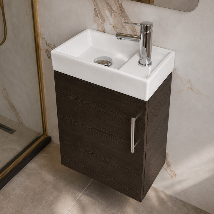 Mito 400mm wall-hung cloakroom vanity unit in Anthracite Oak with compact ceramic basin, satin chrome knurled handle, chrome basin mixer tap and matching slotted basin waste.