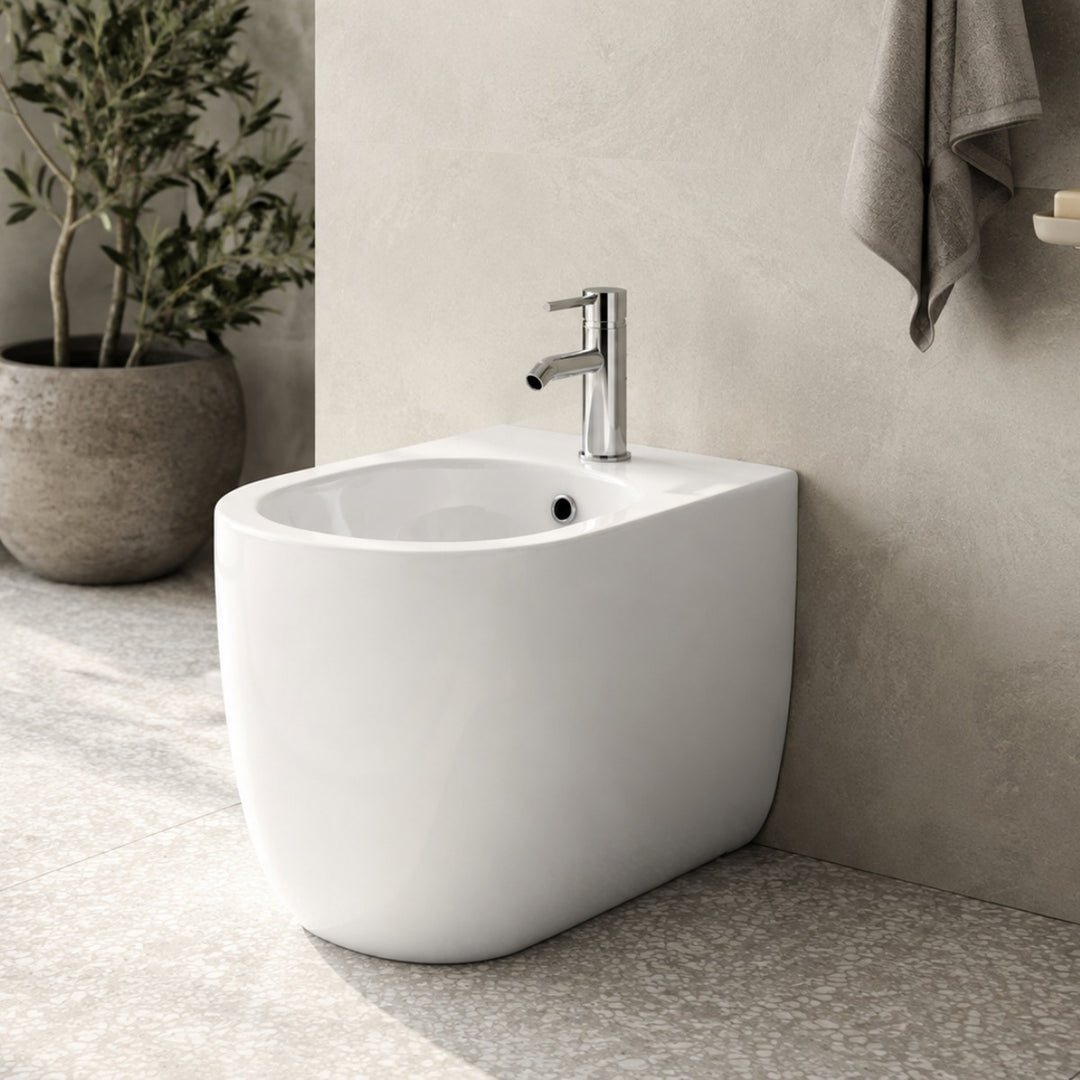 MILADY 520 x 360mm floor standing back to wall bidet with smooth curved styling and a contemporary white finish.