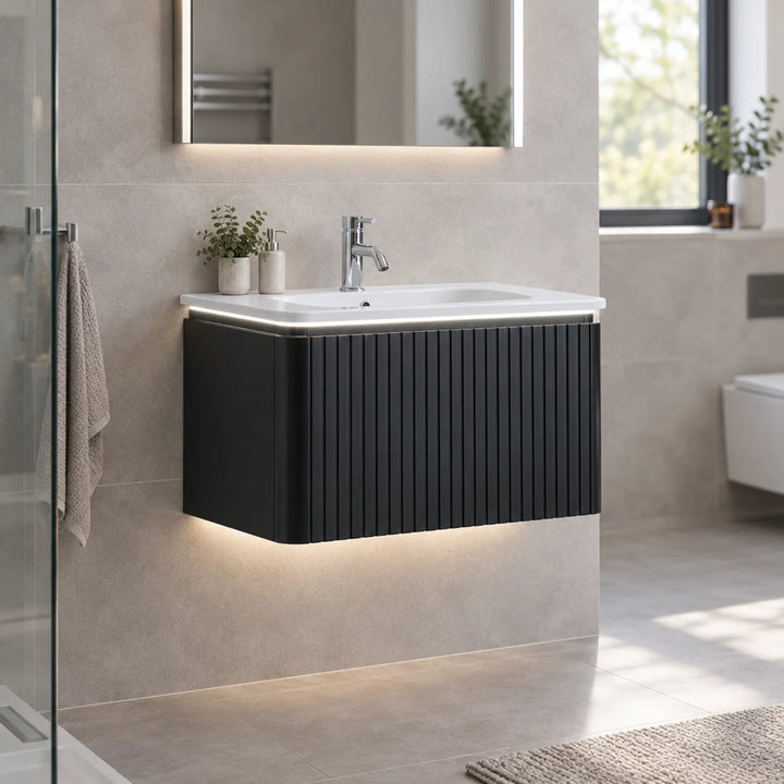Monaco matt black fluted wall mounted vanity unit with LED underlighting in a neutral modern bathroom