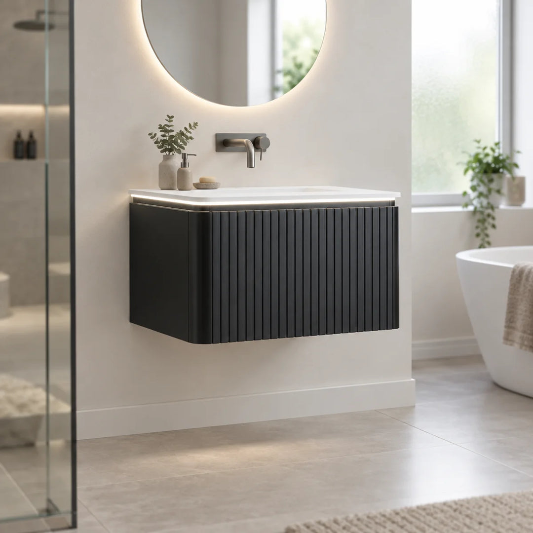 Monaco matt black fluted wall mounted vanity unit with LED worktop in a bright neutral bathroom