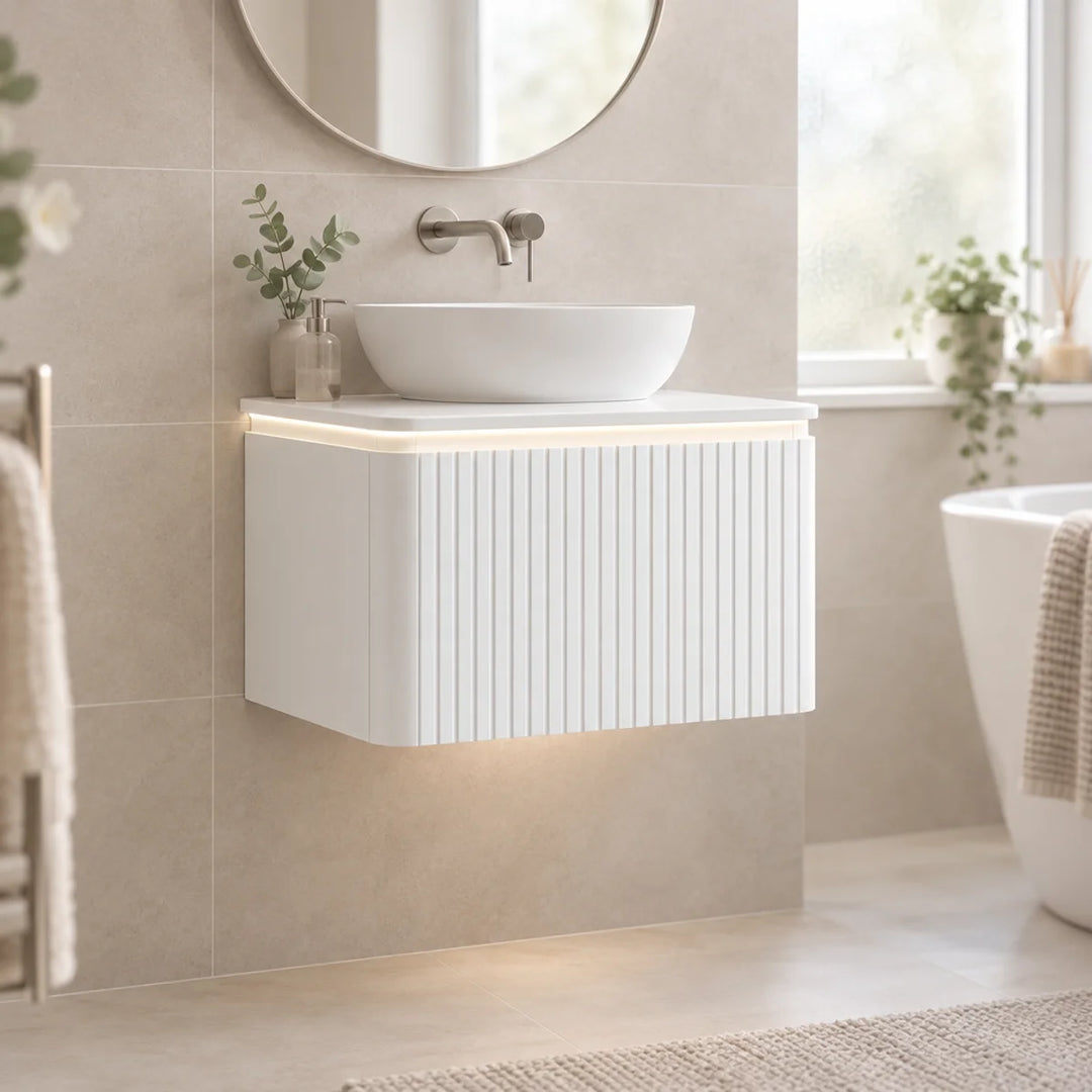 Monaco Matt White fluted wall hung vanity unit with LED underlighting, vessel basin, in a neutral beige bathroom