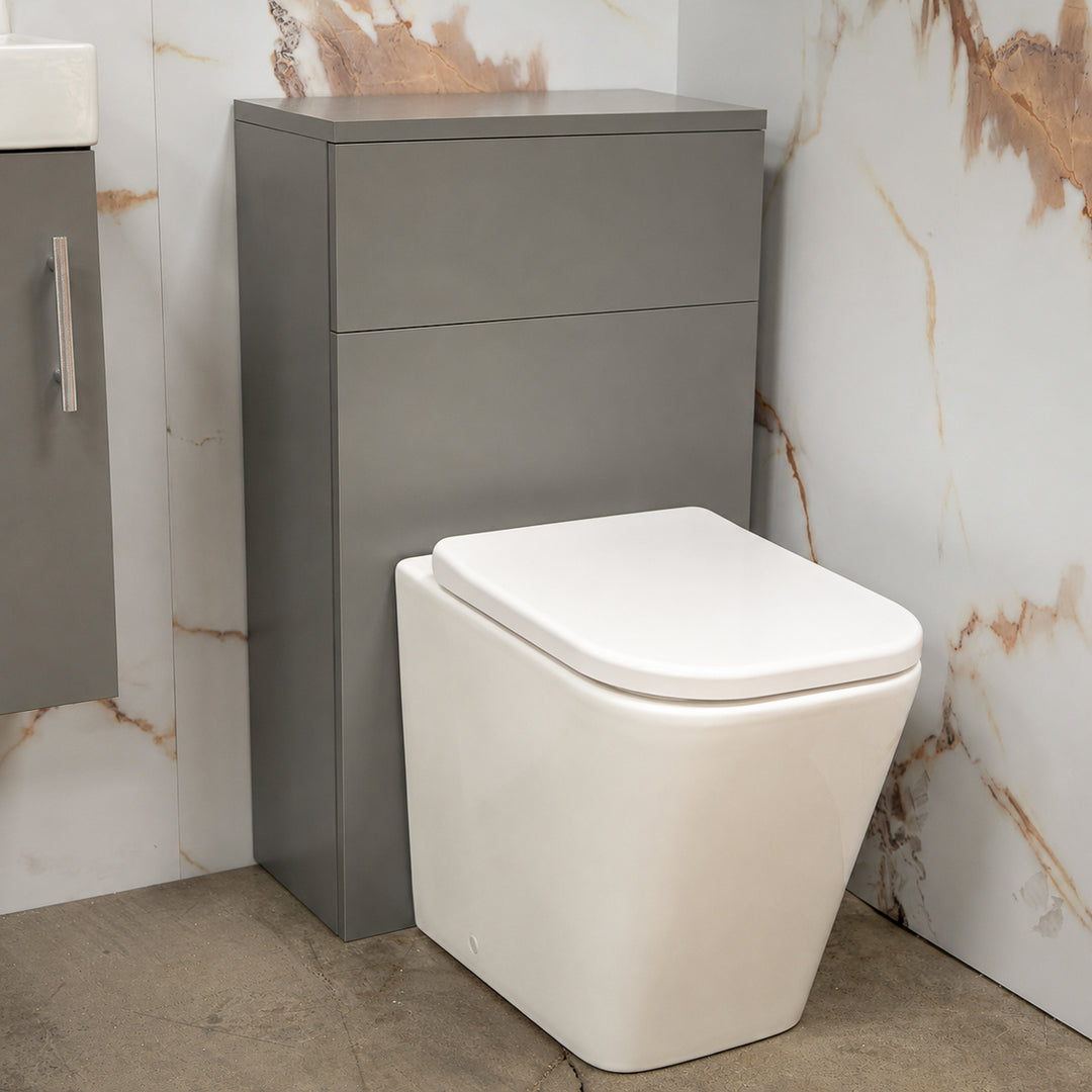 Mito 500mm WC unit in Dove Grey with back-to-wall toilet, soft close seat, concealed dual flush cistern and round chrome flush button for contemporary bathrooms.
