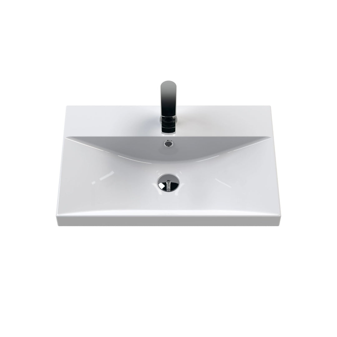 A modern white ceramic bathroom vanity sink with a rectangular basin.