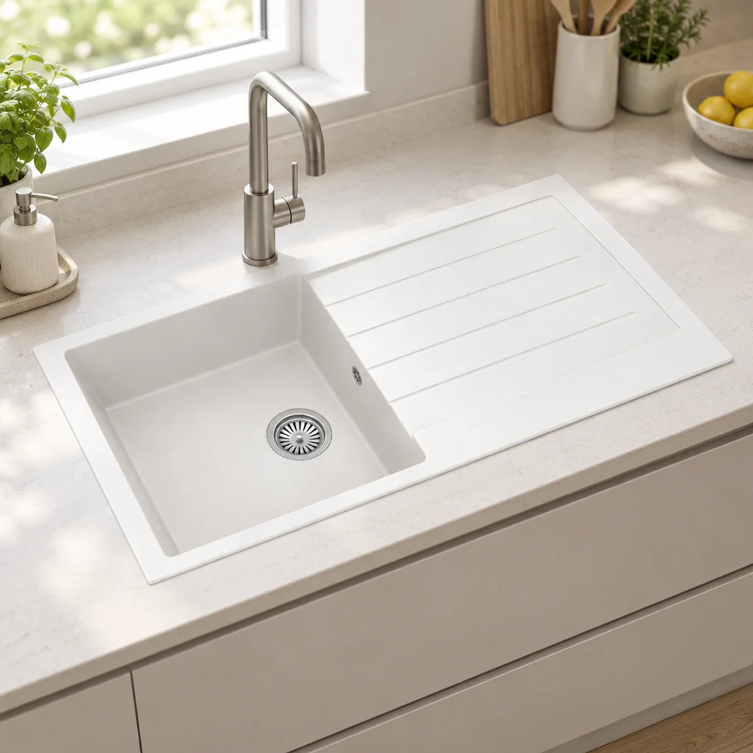 Ellsi Comite white single bowl inset kitchen sink with reversible-style drainer grooves, brushed steel tap and chrome waste in a bright kitchen
