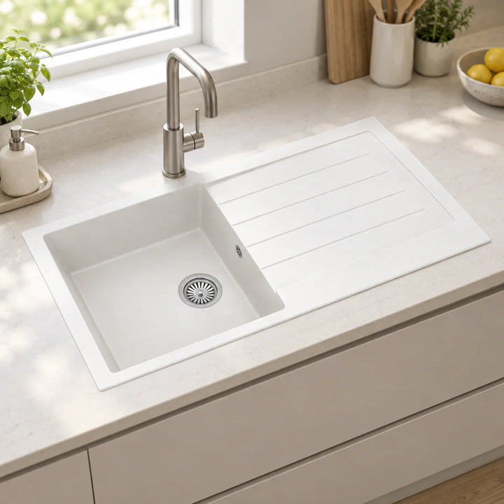Ellsi Comite white single bowl inset kitchen sink with reversible-style drainer grooves, brushed steel tap and chrome waste in a bright kitchen
