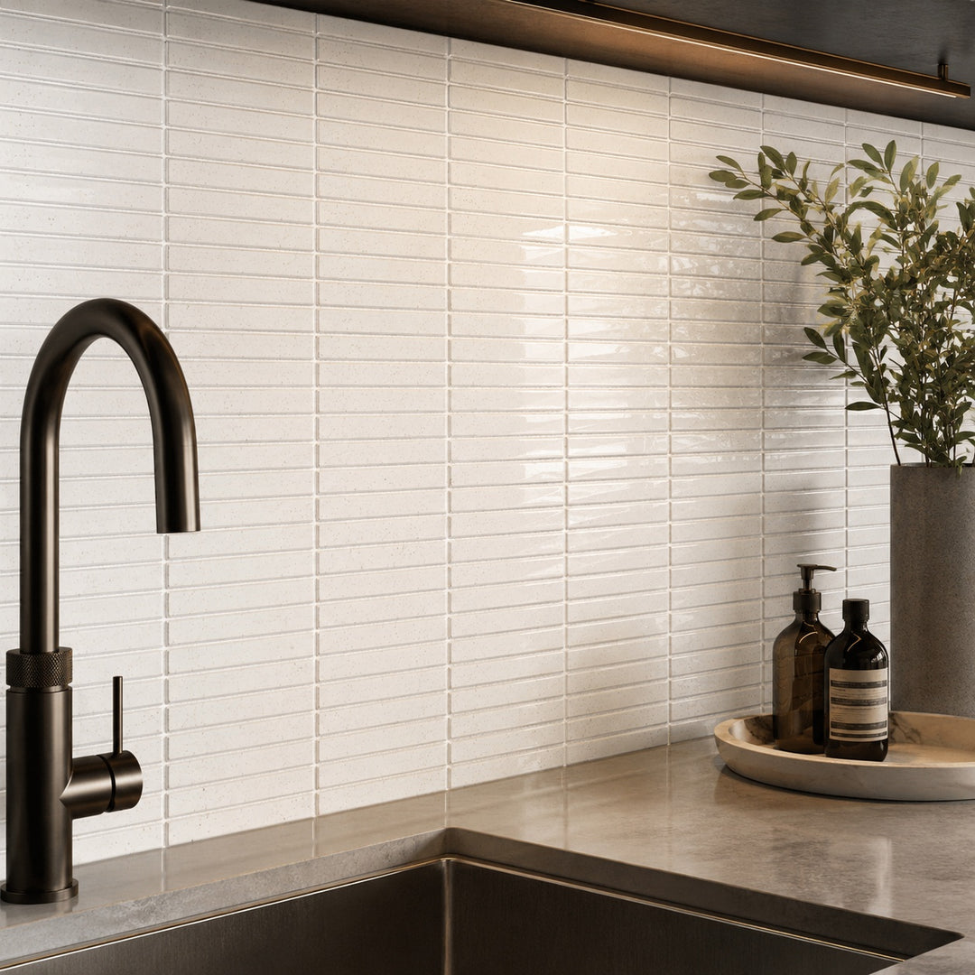 Piano White 29.6 x 29.9cm mosaic sheet featuring glossy white brick-effect mosaic tiles used as a contemporary kitchen splashback.