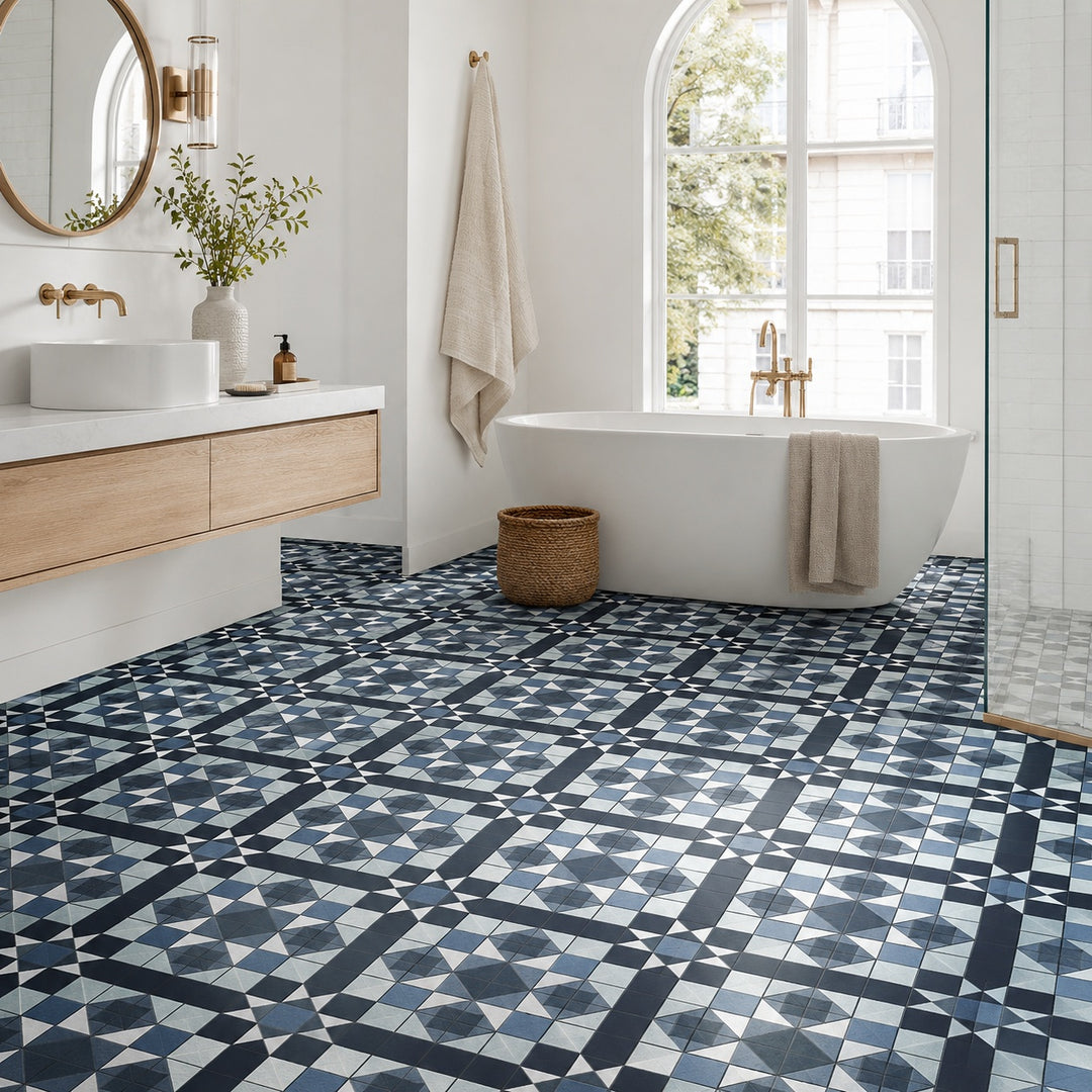 Victoria Multicolour 45 x 45cm ceramic floor tile featuring a geometric pattern in blue, grey and white, ideal for adding decorative character to interior floors.