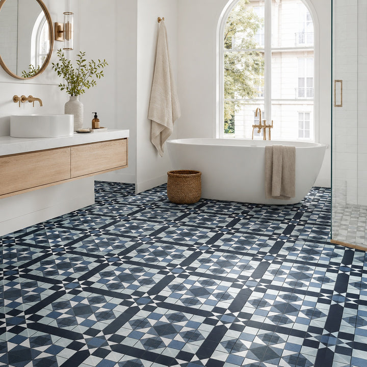 Victoria Multicolour 45 x 45cm ceramic floor tile featuring a geometric pattern in blue, grey and white, ideal for adding decorative character to interior floors.