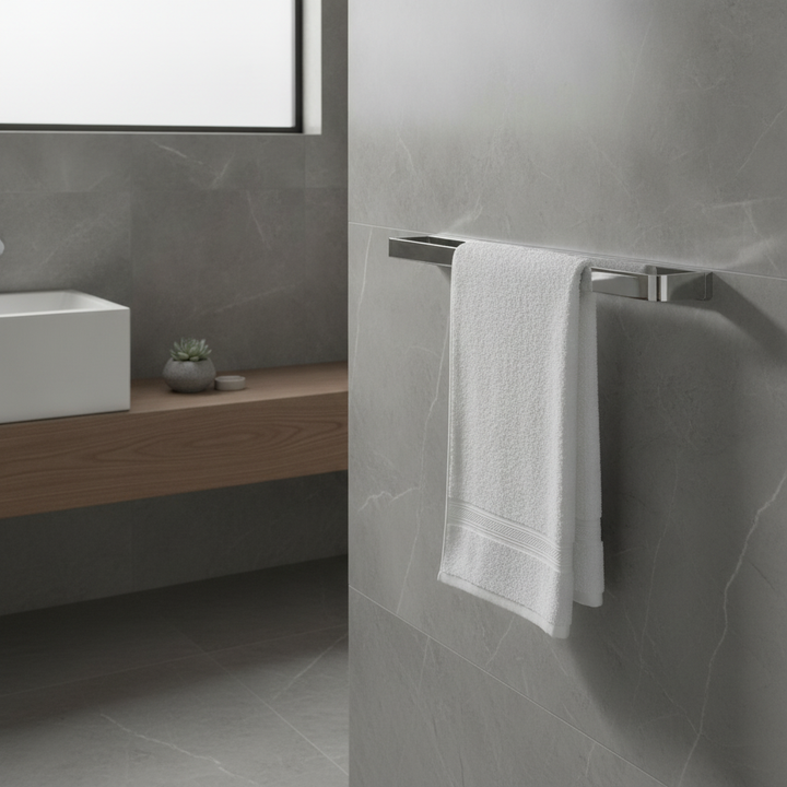 Vesu Disc chrome towel rail with a polished chrome finish and contemporary wall-mounted design, ideal for keeping bathroom towels neatly organised.