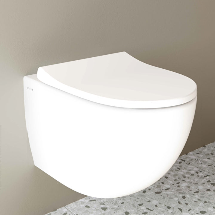 White rimless wall-mounted toilet with soft close seat