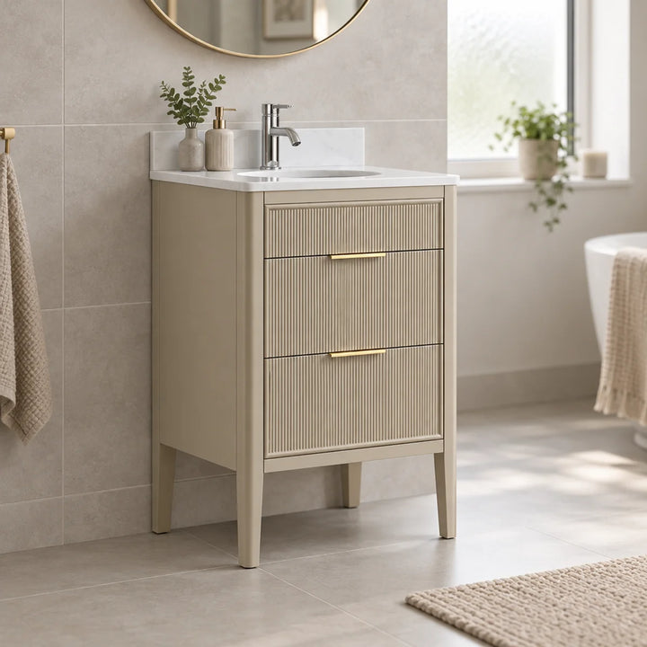 Wilde Fluted 600mm vanity unit in sand with gold handles, white marble top and basin, styled in a neutral bathroom