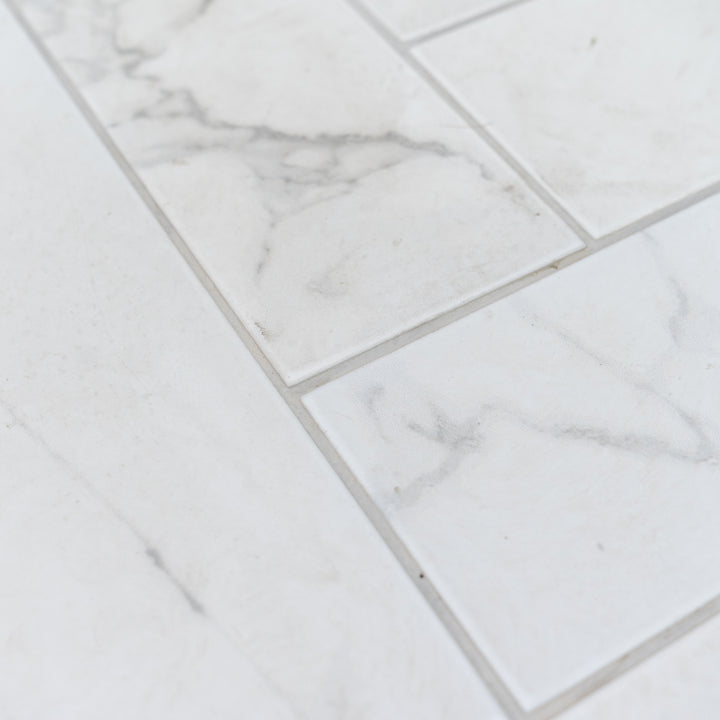 Dortmund Carrara Herringbone 9.9 x 49.2cm Porcelain Tile - 0.73sqm perbox