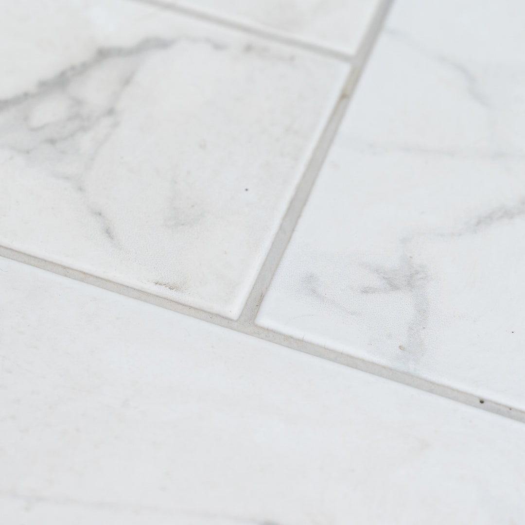 Dortmund Carrara Herringbone 9.9 x 49.2cm Porcelain Tile - 0.73sqm perbox