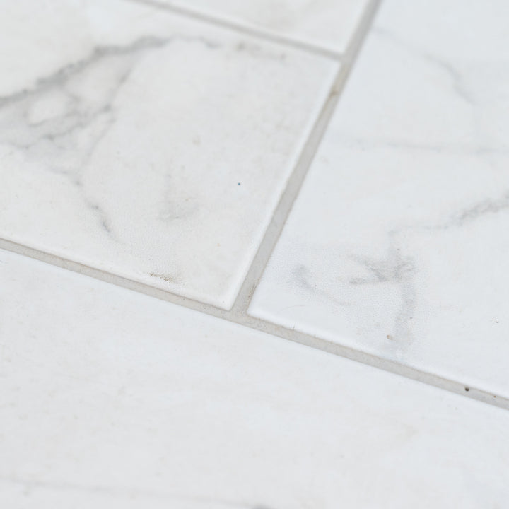Dortmund Carrara Herringbone 9.9 x 49.2cm Porcelain Tile - 0.73sqm perbox