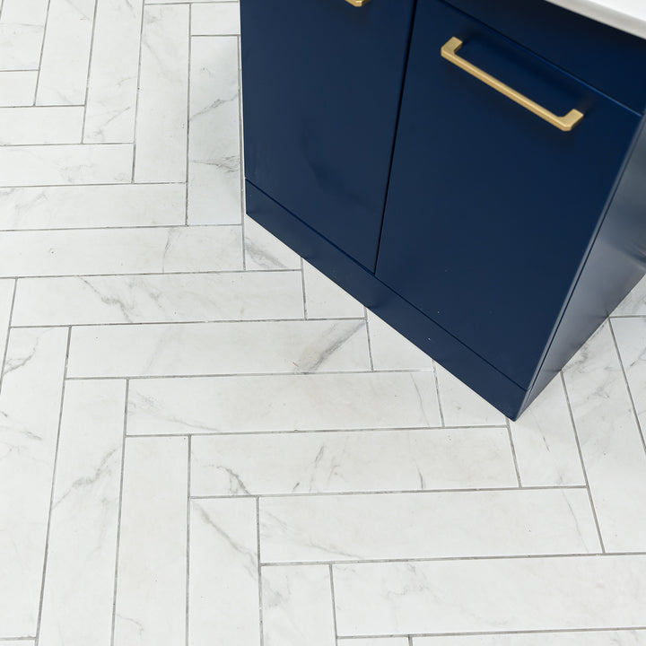 Dortmund Carrara Herringbone 9.9 x 49.2cm Porcelain Tile - 0.73sqm perbox