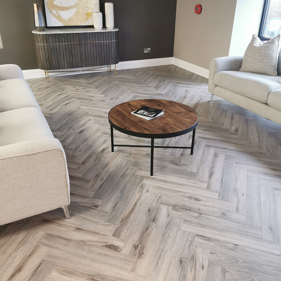 Volcanic Oak Herringbone 12mm Laminate Wooden Flooring - 1.92sqm per pack